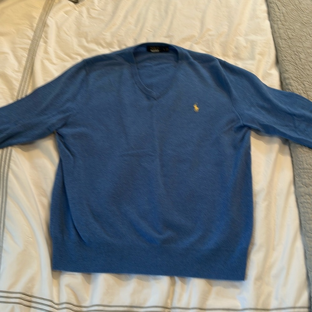 Light blue v-neck sweater. Excellent condition. Size Large